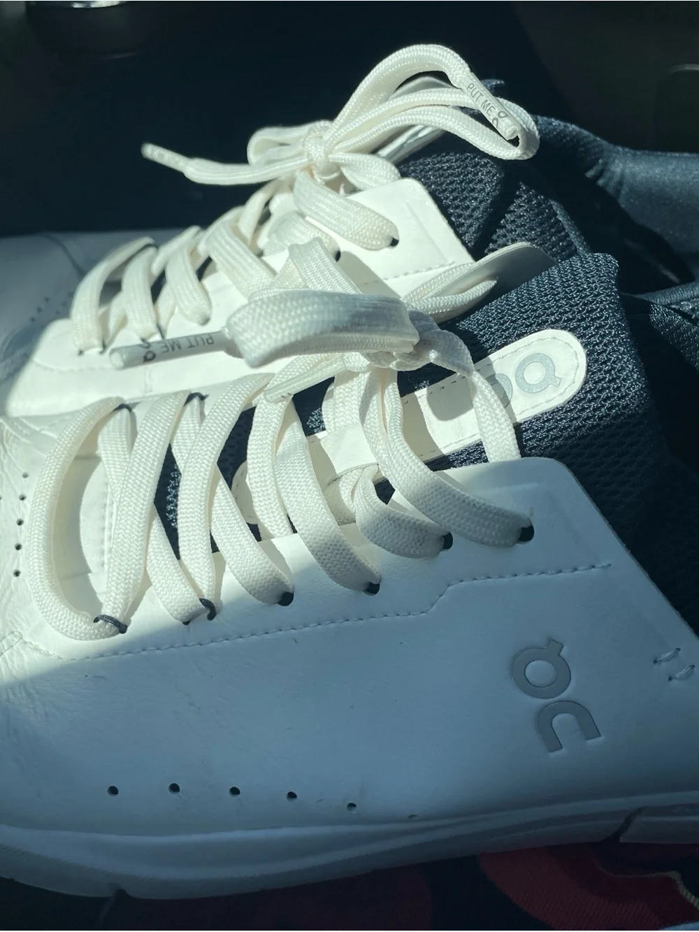 On Running Men’s White and Navy Low-Top Sneakers